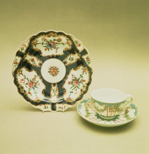 Worcester porcelain plate with scale blue decoration, 1768; teacup and saucer with hop trellis-work decoration, c.1770